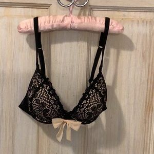 A lovely lace bra with soft blush lining and feminine blush bow